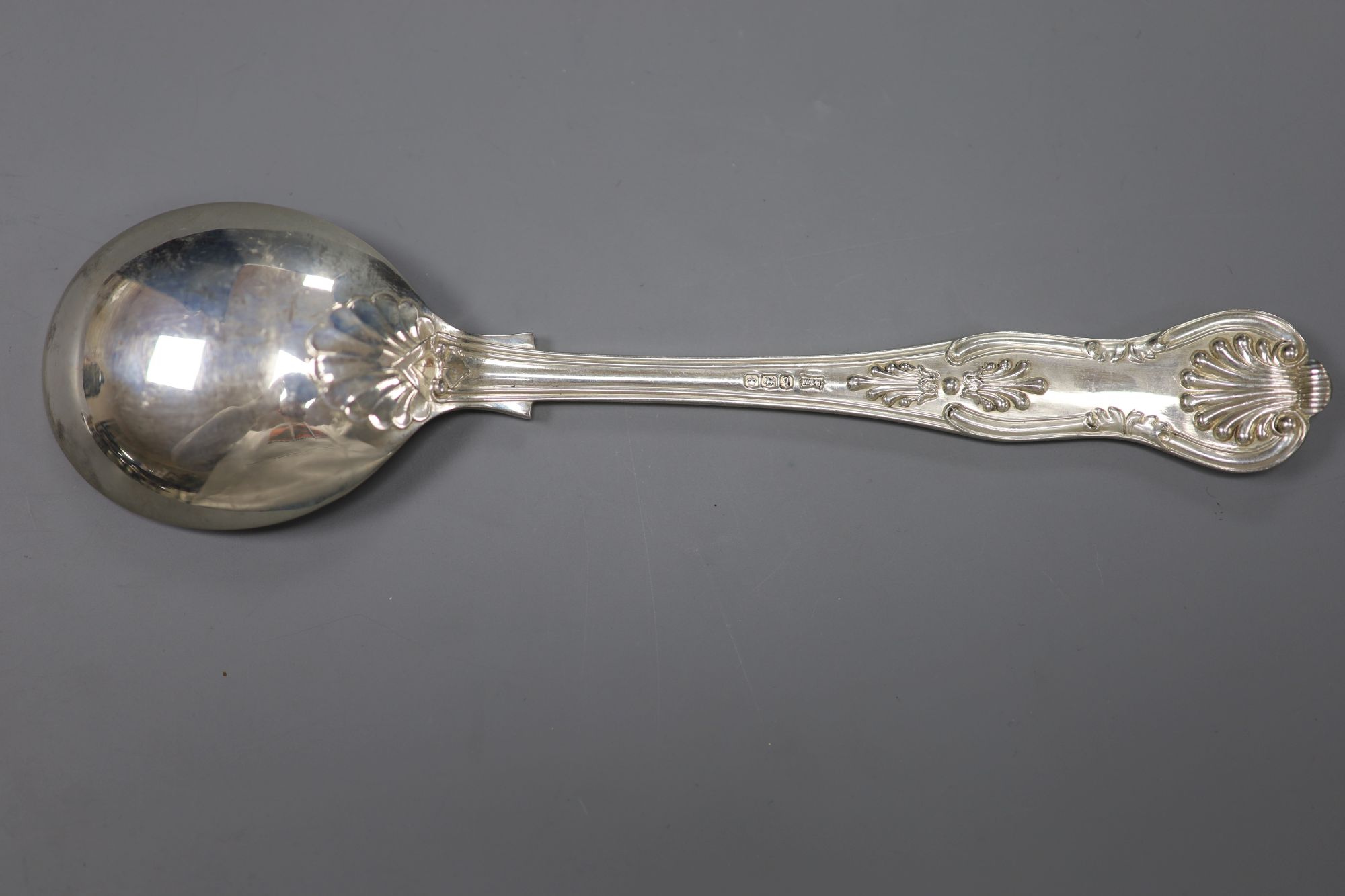 A set of eight George V silver Kings pattern soup spoons, Walker & Hall, Sheffield, 1933, 23.25oz.